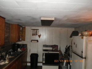 fire damage restoration basement kitchen before
