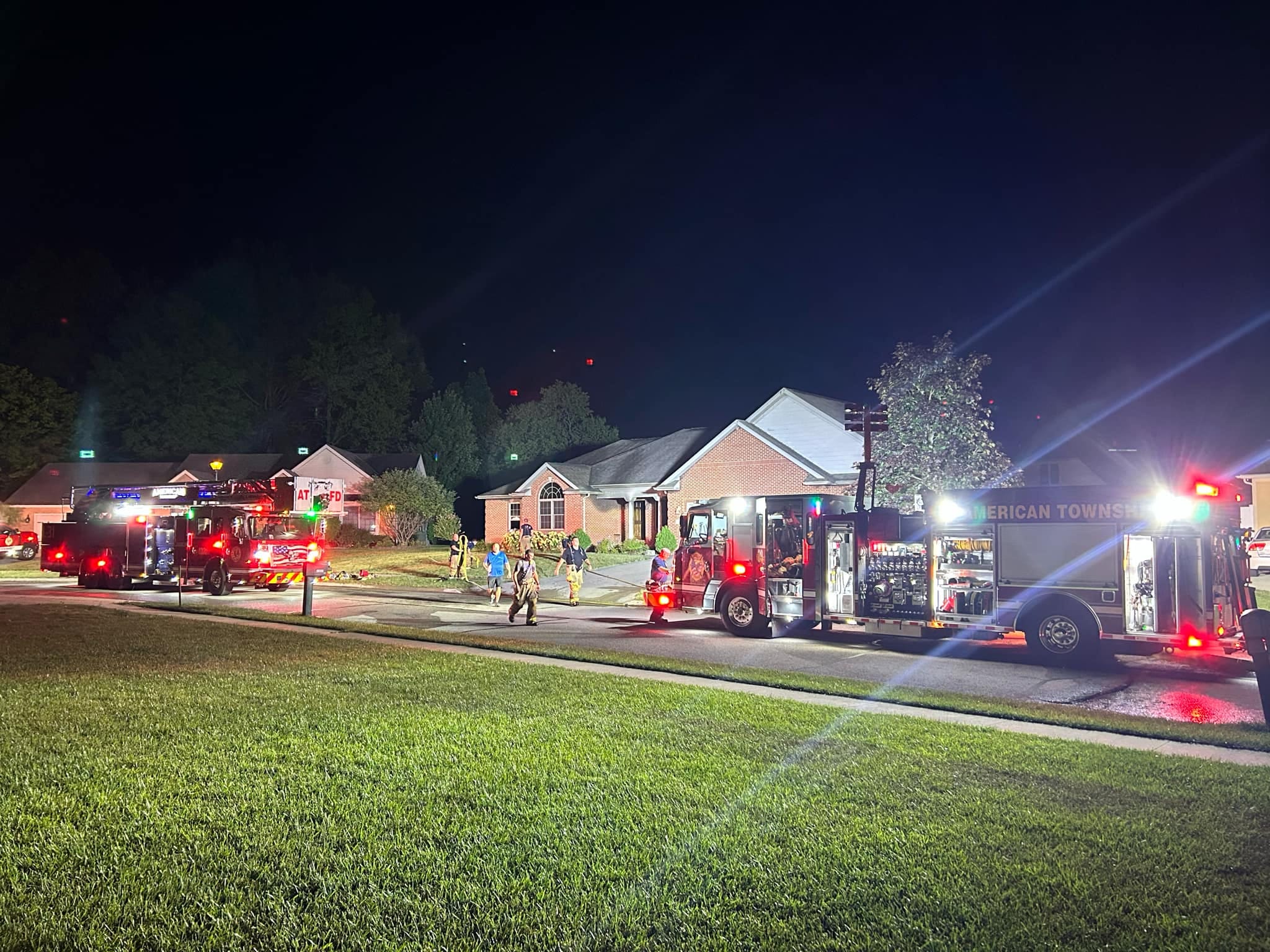 A fire department putting out a fire at a house in Lima, Ohio.
